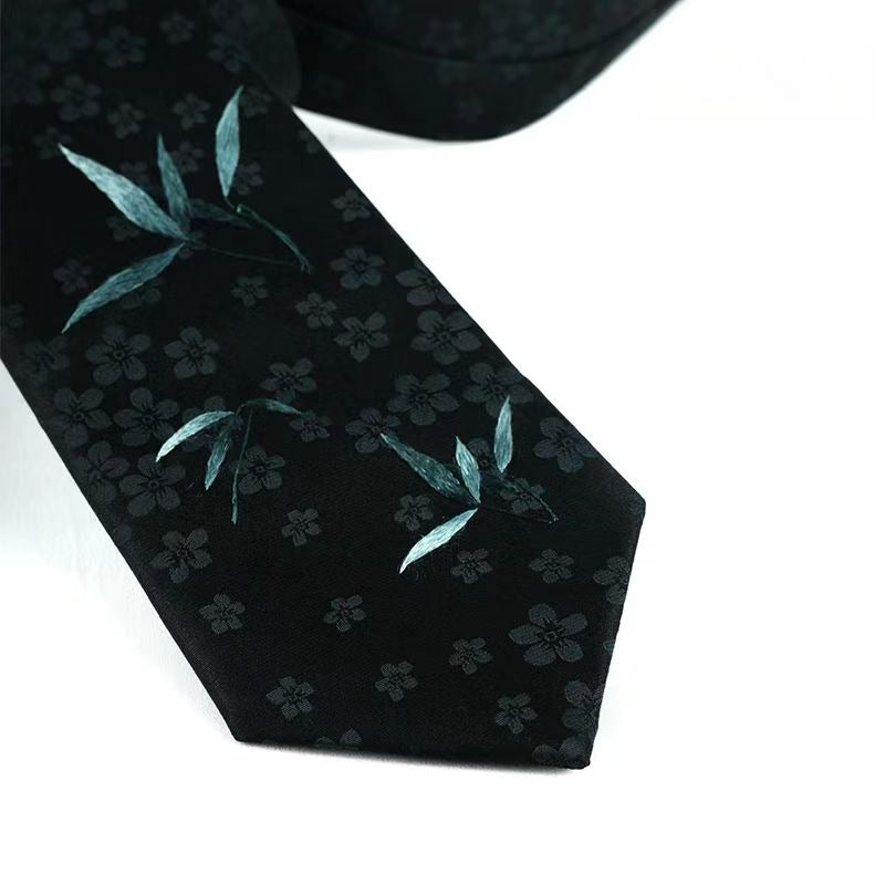 Hand-embroidered high-end custom tie with bamboo shadows and gentle breeze